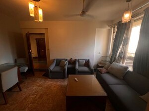 Living Room in 1 BHK Apartment at Hiranandani Estate Penrose, Thane West – for Rent