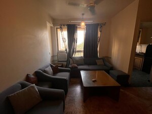 Living Room in 1 BHK Apartment at Hiranandani Estate Penrose, Thane West – for Rent
