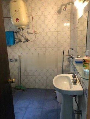 Bathroom in 3 BHK Apartment at Gee Cee Enclave, The Mall Avenue – for Rent