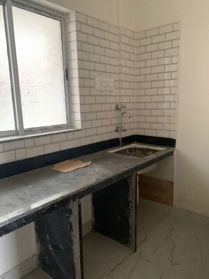 Kitchen in 2 BHK Apartment at Raja Bazar – for Sale