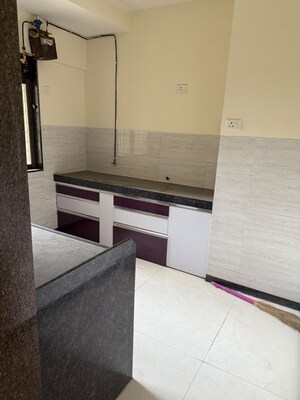 Kitchen in 2 BHK Apartment at Acme Ozone Phase II, Manpada – for Rent