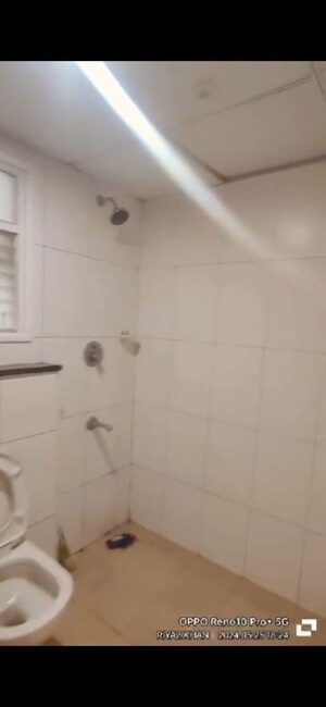 Bathroom in 2 BHK Apartment at Godrej Aqua, International Airport Road – for Rent