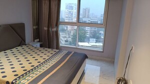 Bedroom in 2 BHK Apartment at MICL Insignia, Vile Parle West – for Rent