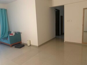 Living Room in 2.5 BHK Apartment at Rustomjee Elanza, Malad West – for Rent
