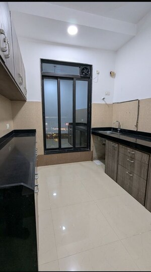 Kitchen in 2.5 BHK Apartment at Rustomjee Elanza, Malad West – for Rent