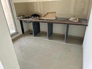 Kitchen in 2 BHK Apartment at Puranik Rumah Bali, Ghodbunder Road – for Sale