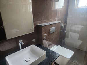 Bathroom in 3 BHK Apartment at Maya Green Lotus Utsav, International Airport Road – for Rent