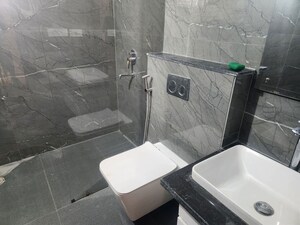 Bathroom in 3 BHK Apartment at Maya Green Lotus Utsav, International Airport Road – for Rent