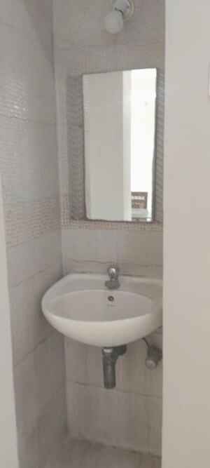 Bathroom in 3 BHK Apartment at Samartha Aangan, Andheri West – for Rent