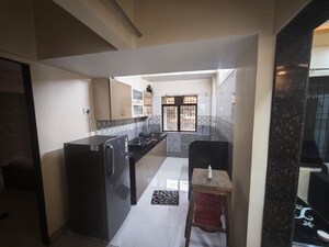 Kitchen in 1 BHK Apartment at Lok Upvan Apartment Phase 2, Vasant Vihar – for Sale