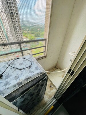 Balcony in 2 BHK Apartment at Mahavir Kalpavruksha, Ghodbunder Road – for Sale