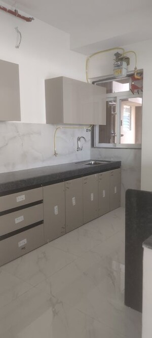 Kitchen in 2 BHK Apartment at Anant Metropolis Insignia Towers, Kasarvadavali – for Rent