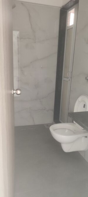 Bathroom in 2 BHK Apartment at Anant Metropolis Insignia Towers, Kasarvadavali – for Rent