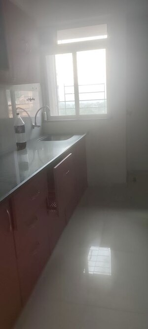 Kitchen in 2 BHK Apartment at Puranik Hometown Phase III, Ghodbunder Road – for Rent