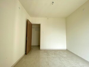 Room in 2 BHK Apartment at Godrej Emerald, Ghodbunder Road – for Sale