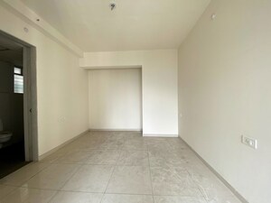 Room in 2 BHK Apartment at Godrej Emerald, Ghodbunder Road – for Sale