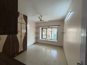 Room in 2 BHK Apartment at Lokhandwala Whispering Palms, Kandivali East – for Rent