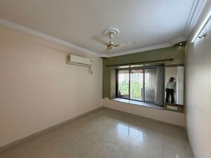 Room in 2 BHK Apartment at Lokhandwala Whispering Palms, Kandivali East – for Rent