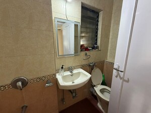 Bathroom in 2 BHK Apartment at Lokhandwala Whispering Palms, Kandivali East – for Rent