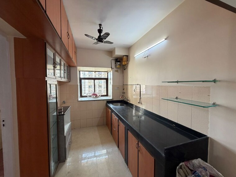 Kitchen, lokhandwala-whispering-palms 2 Bedroom 930 Sq.Ft. Apartment In Kandivali East Mumbai 10735838