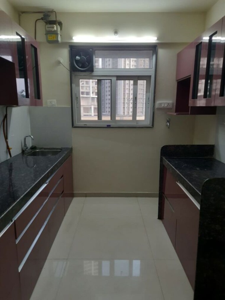 Kitchen, ashar-axis 2 Bedroom 678 Sq.Ft. Apartment In Majiwada Thane 10735903