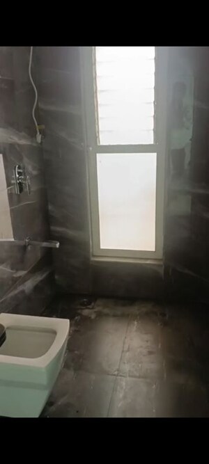Bathroom in 2 BHK Apartment at Andheri CHS, Andheri West – for Rent
