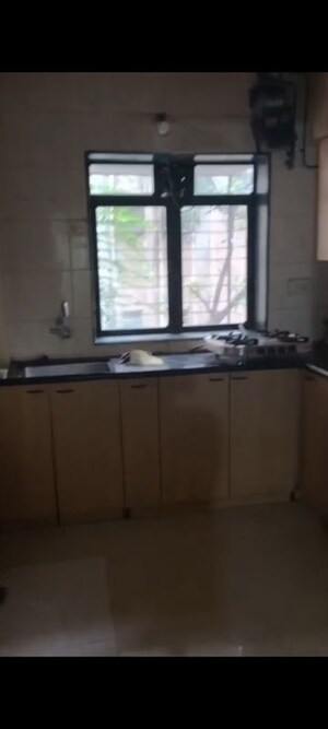 Kitchen in 1 BHK Apartment at Jumbo Darshan, Andheri East – for Rent