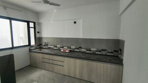Kitchen in 2.5 BHK Apartment at Unique Youtopia, Kharadi – for Sale