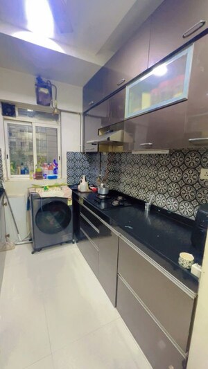 Team Area in 1 BHK Apartment at Lodha Amara, Kolshet Road – for Rent