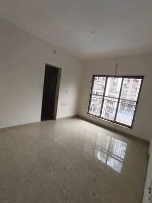 Master Bedroom in 2 BHK Apartment at Vardhman Grandeur, Andheri West – for Rent