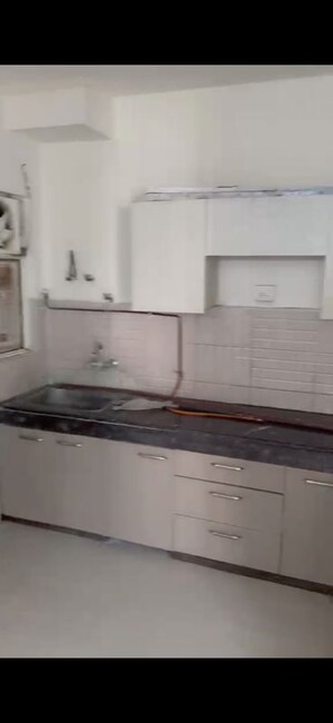 Kitchen in 3 BHK Apartment at Earthcon Sanskriti, Sector 1 Greater Noida – for Rent