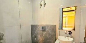 Bathroom in 3 BHK Apartment at Janakpuri – for Sale
