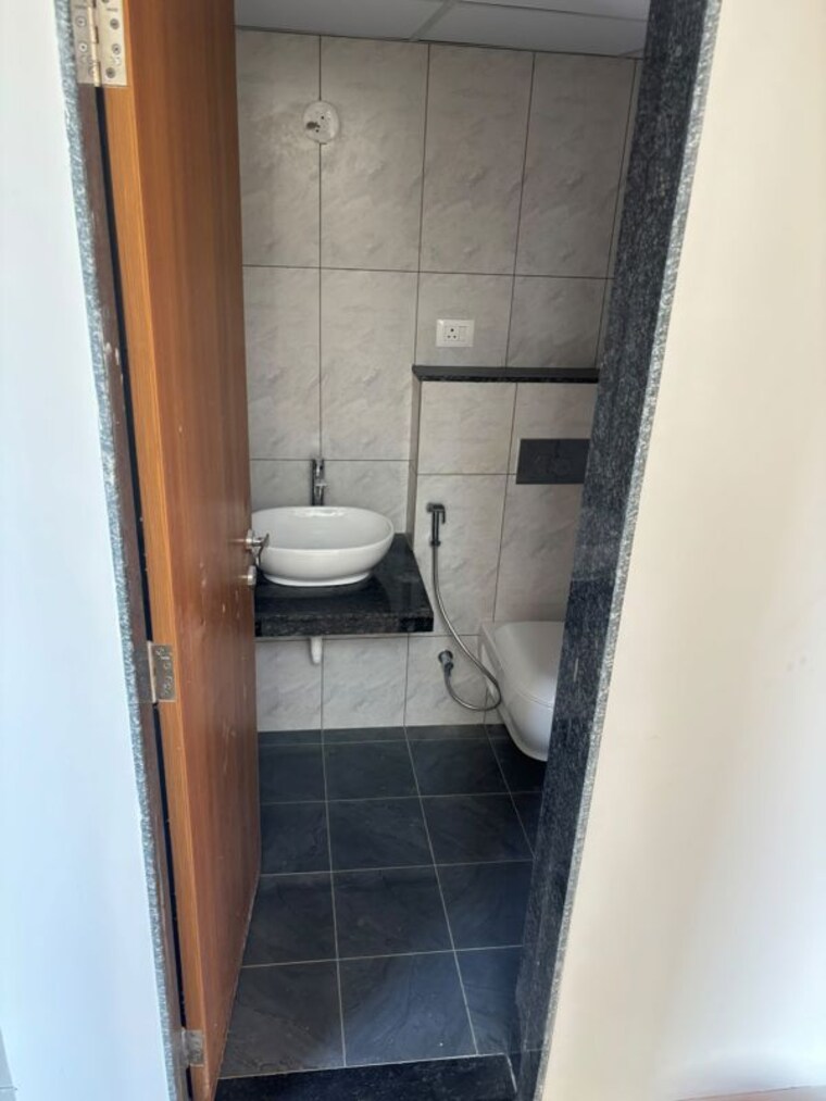 Bathroom, gera-planet-of-joy 2 Bedroom 1076 Sq.Ft. Apartment In Kharadi Pune 10736341