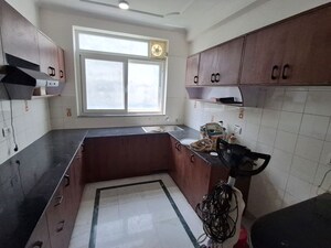 Kitchen in 3 BHK Apartment at Uppal Southend, Sector 49 – for Rent