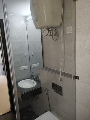 Bathroom in 3.5 BHK Apartment at Microtek Greenburg, Sector 86 – for Rent