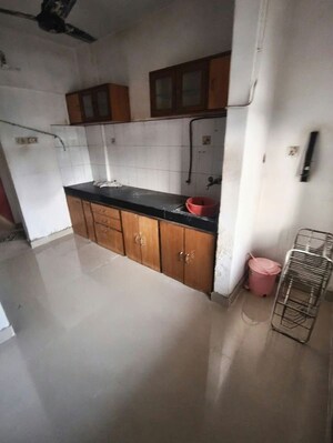 Kitchen in 2 BHK Apartment at Happy Valley, Manpada – for Rent