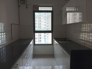 Kitchen in 2 BHK Apartment at Kalpataru Immensa, Kolshet Road – for Rent