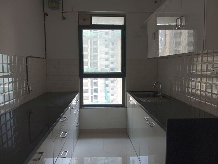 Kitchen, kalpataru-immensa 2 Bedroom 637 Sq.Ft. Apartment In Kolshet Road Thane 10736658