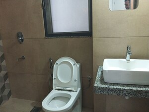 Bathroom in 2 BHK Apartment at Kalpataru Immensa, Kolshet Road – for Rent