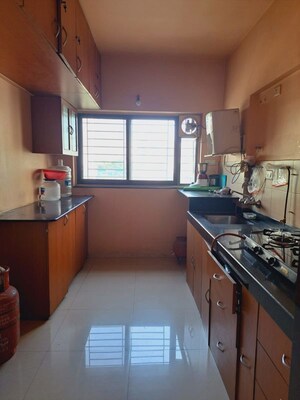 Kitchen in 3 BHK Apartment at Yashada Bluewoods, Pimple Saudagar – for Rent