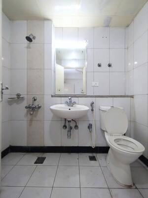 Bathroom in 3 BHK Apartment at AWHO Sandeep Vihar, Whitefield – for Rent