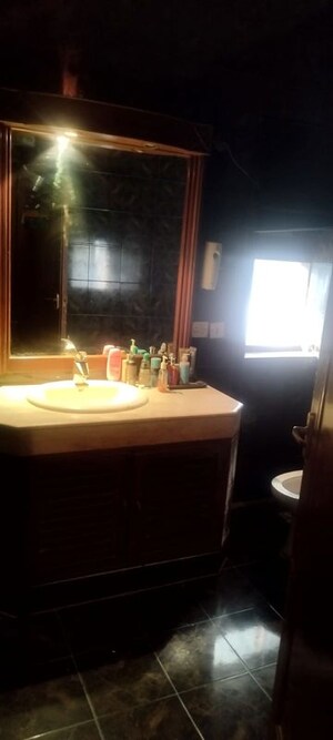 Bathroom in 4 BHK Builder Floor at Panchsheel Park – for Sale
