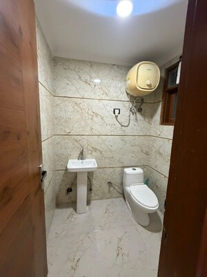 Bathroom in 2 BHK Builder Floor at Chattarpur – for Rent