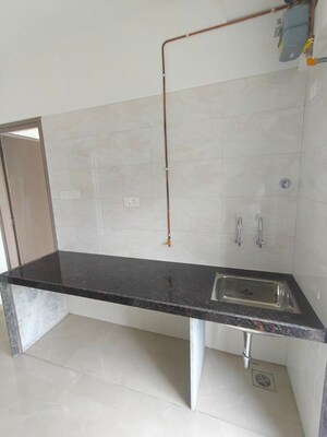 Kitchen in 1 BHK Apartment at Ashtha Sharon, Dahisar West – for Sale