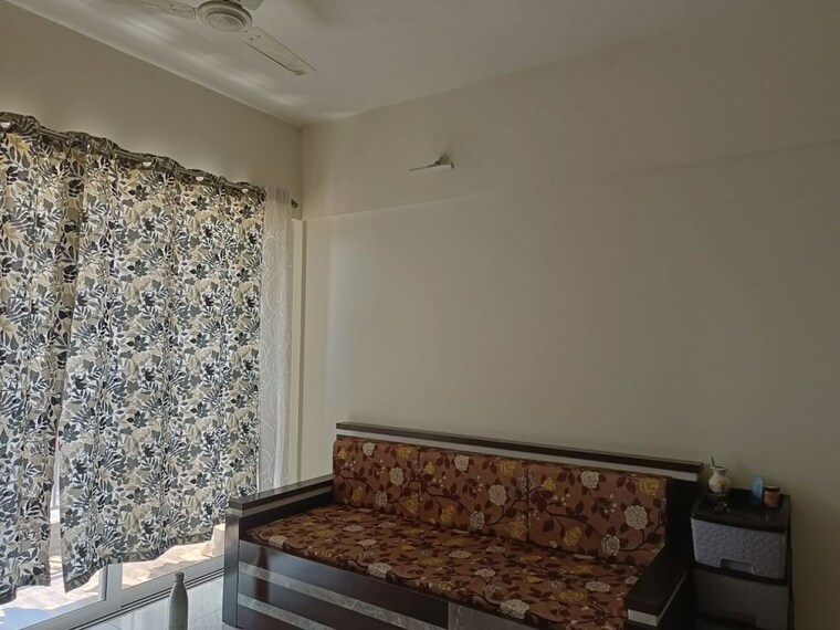 Living Room, kolte-patil-life-republic 1 Bedroom 453 Sq.Ft. Apartment In Hinjewadi Pune 10736919