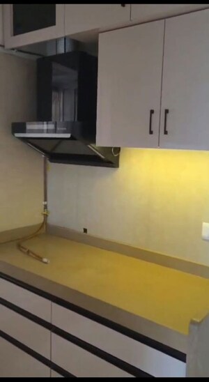 Kitchen in 2 BHK Apartment at Dosti West County, Balkum Pada – for Rent