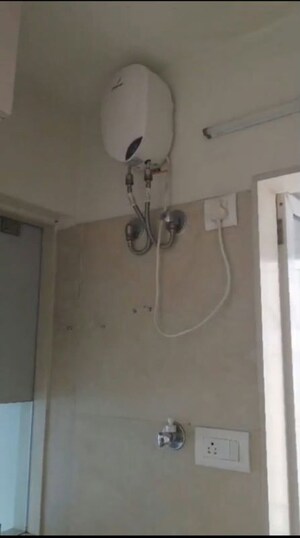 Bathroom in 2 BHK Apartment at Dosti West County, Balkum Pada – for Rent