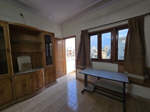 Living Room in 4 BHK Apartment at Shalimar Bagh – for Sale