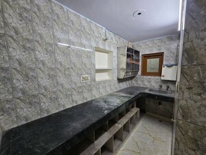 Kitchen in 4 BHK Apartment at Shalimar Bagh – for Sale