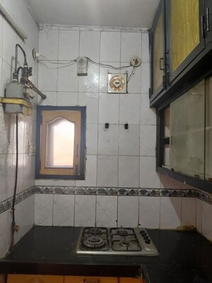 Kitchen in 4 BHK Apartment at Shalimar Bagh – for Sale